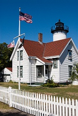 American Flags Waving By West Chop Light in Massachusetts